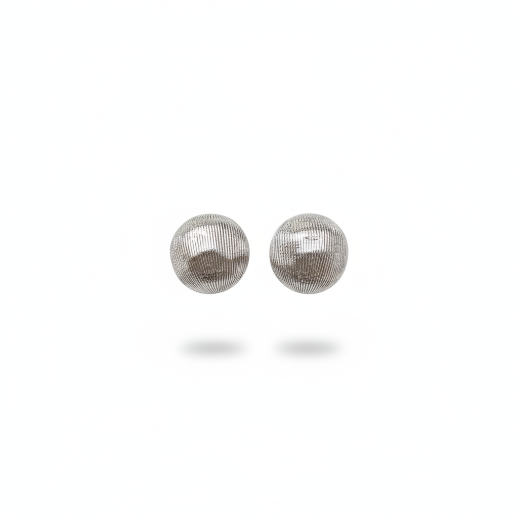 Pair of silver mesh sphere earrings on a white background