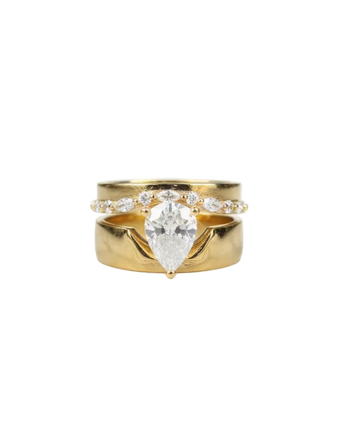 Pear shape center stone candle ring stacked with band with marquise stones and opening 